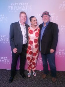 Winner Scott Vaughn (left) with star Katy Perry and Veterans Matter founder Ken Leslie backstage in Cleveland.